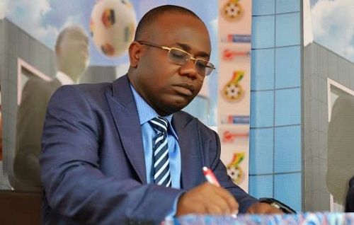 kwesi nyantakyi writing in office